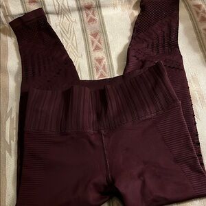Athleta burgundy laser cut leggings